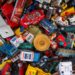 a pile of plastic toy cars